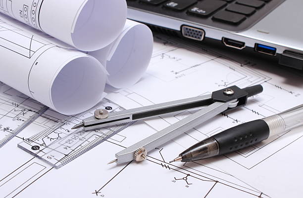 istock Electrical diagrams, accessories for drawing and laptop 527677901