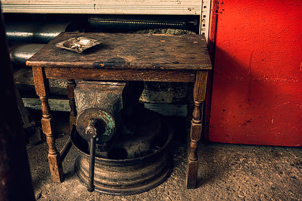 istock Ashtray on a grunge wooden table with old mechanical tools 527677916