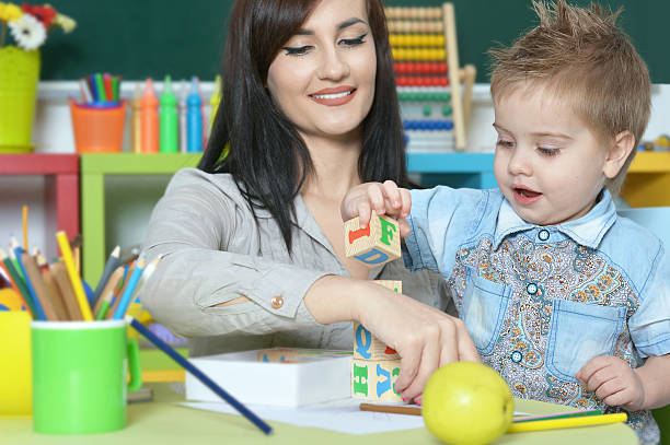 istock little boy playing  with mother 527678492