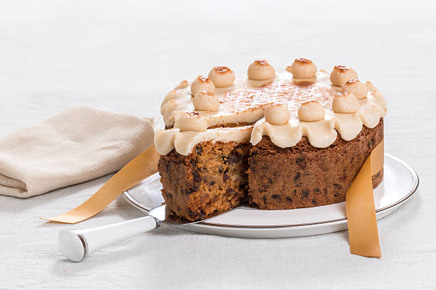 istock Simnel cake on a plate with marzipan on the top, 527678915