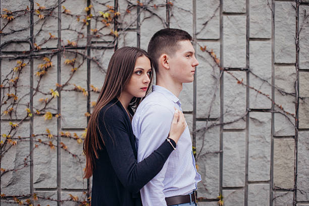 istock Lovely couple hugging on the street 527680456