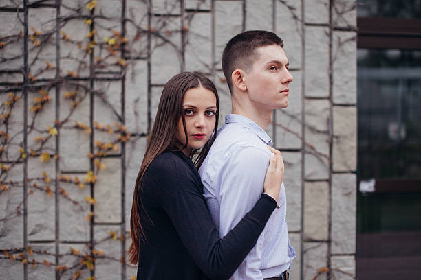 istock Lovely couple hugging on the street 527680638