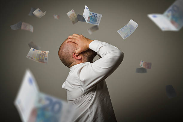 Grief. Man in thoughts and Euro. Recession concept Grief. Man in white and Euro. Business depression and recession concept. money cry stock pictures, royalty-free photos & images
