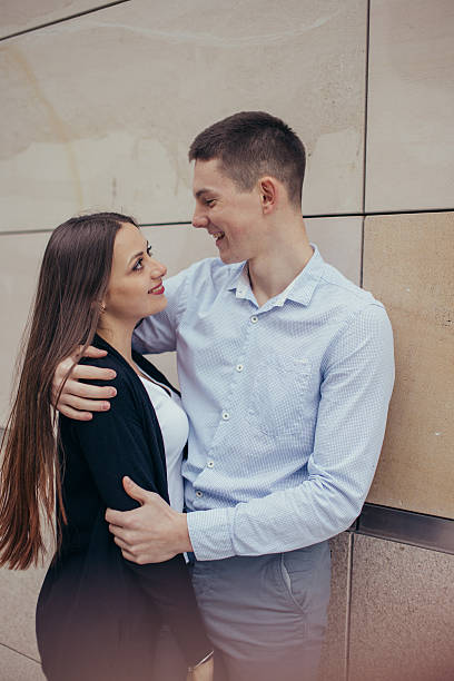 istock Lovely couple hugging on the street 527682278
