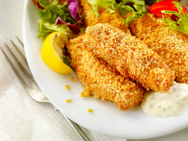 istock Breaded and Baked Fish Sticks with Tarter Sauce 527682922
