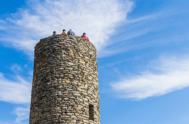 Vernazza, Italy - October 20, 2015: Unidentified tourists on the stone tower of Castello Doria, Vernazza, Cinque Terre, Liguria, Italy