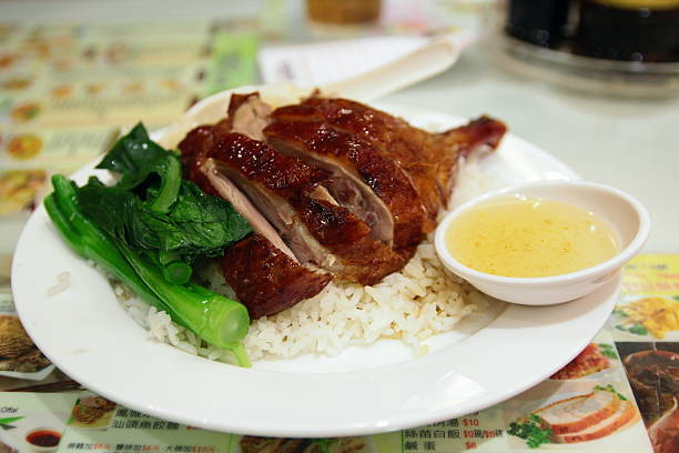 Roast duck with vegetable and rice at local Hong Kong restaurant