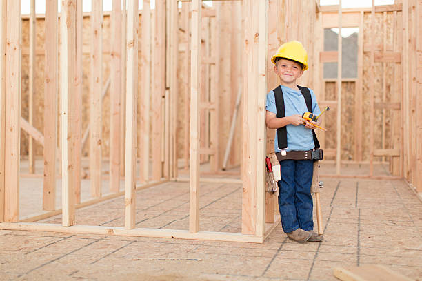 istock Portrait of a Young Boy dressed as Construction Worker 527687520