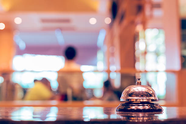 Restaurant bell service Restaurant bell service vintage with bokeh hotel occupation concierge bell service stock pictures, royalty-free photos & images