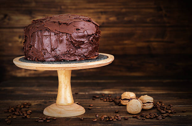 istock Chocolate cake on dark wooden bckground 527691124