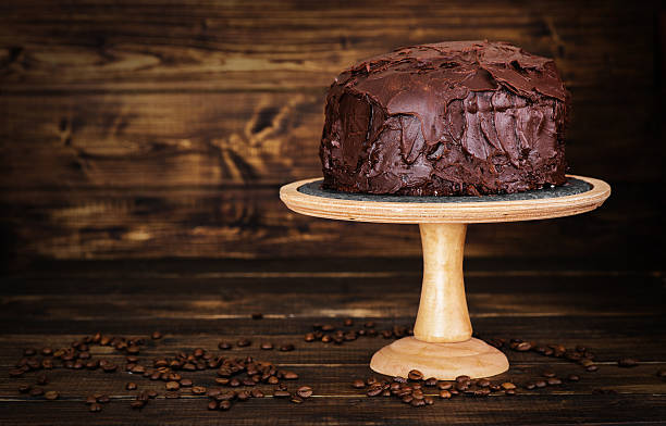 istock Chocolate cake on dark wooden bckground 527691712