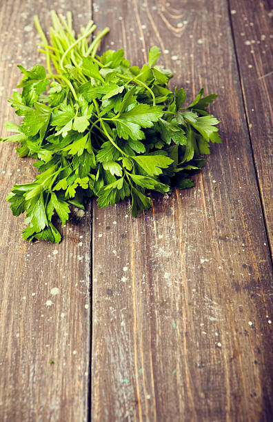 istock Fresh Parsley On Wood 527692149