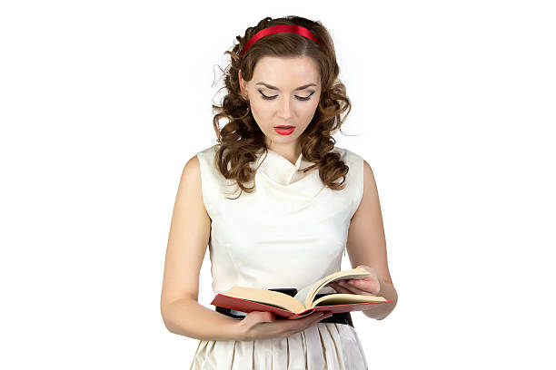 istock Image of pinup woman reading book 527692891