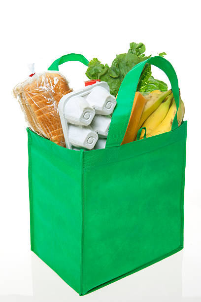 sac de courses réutilisable - green bag paper bag isolated photos et images de collection