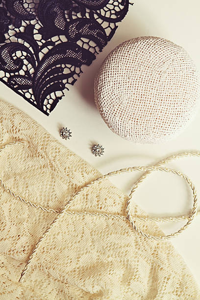 istock Deconstructed millinery materials lace and hat block 527694925