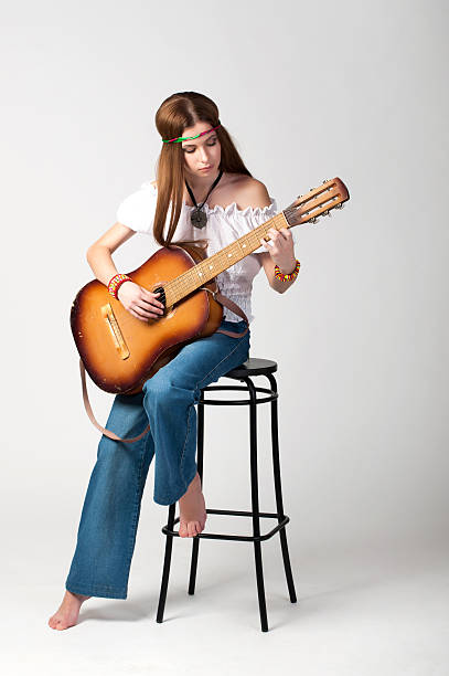 istock The girl with a guitar 1306. 527695831