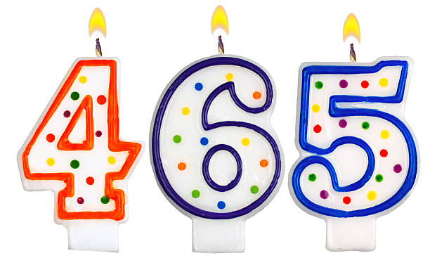 istock candles number four hundred sixty five isolated on white 527701023