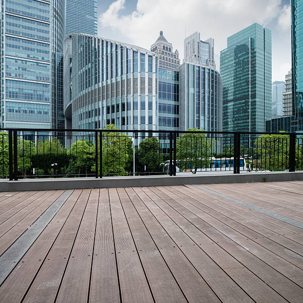 istock Office buildings and wooden platforms 527702511