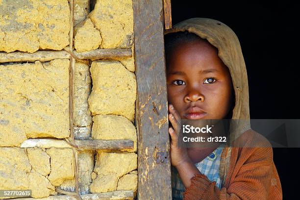 Madagascarshy And Poor African Girl With Headkerchief Stock Photo - Download Image Now