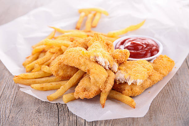 istock french fries and chicken 527703069