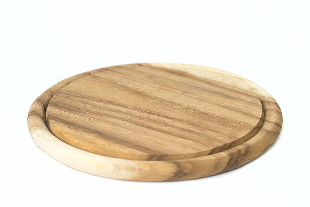 istock Wooden cutting board isolated on white background 527703903