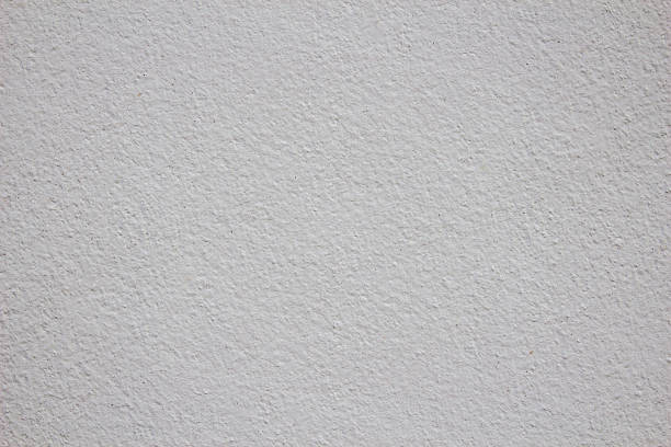 istock Beige background of concrete wall texture. 527704851