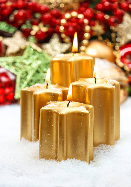 istock festive advent decoration with four burning candles 527706641