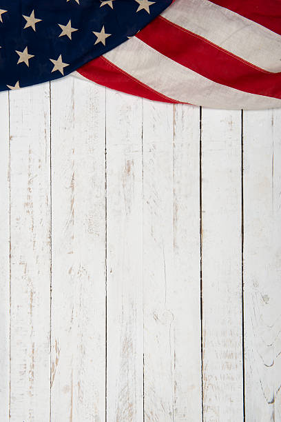 white wooden background with an American flag