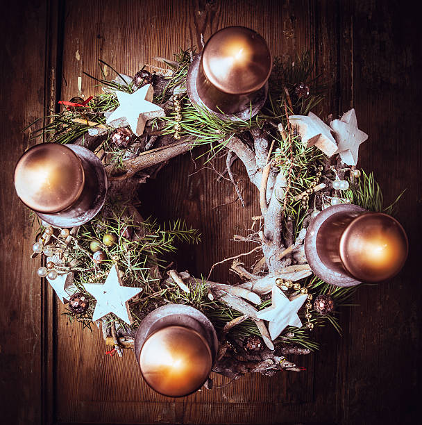 istock Advent wreath with burning candles , Christmas card, top view, toned 527723883