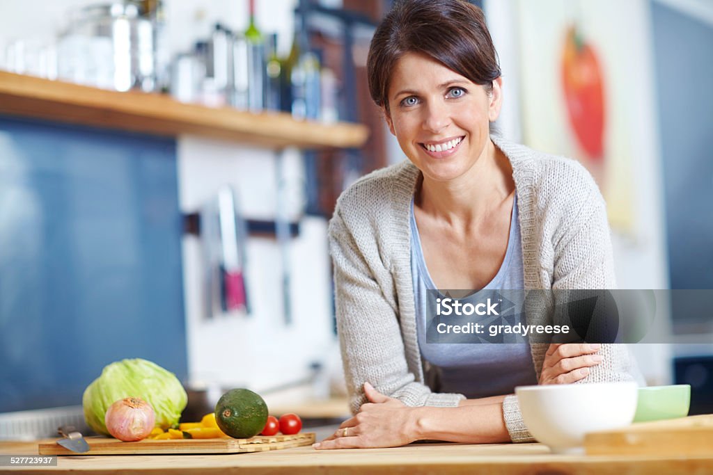 I use only the freshest ingredients Portrait of an attractive woman leaning on a kitchen counter filled with vegetables 30-39 Years Stock Photo