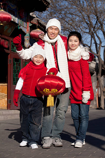 istock Family Celebrates Chinese New Year 527724171