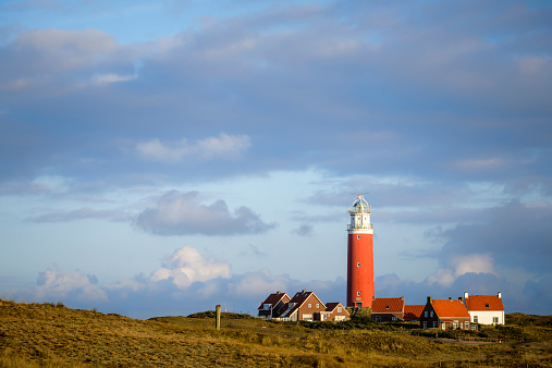 A picturesque scene of white houses on the hill in Lonstrup, Denmark