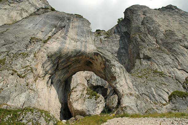 istock Rock arch. Piatra Craiului mountains, Romania 527724469