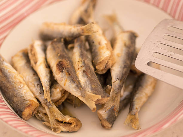 istock Fried anchovies in bowl 527725677