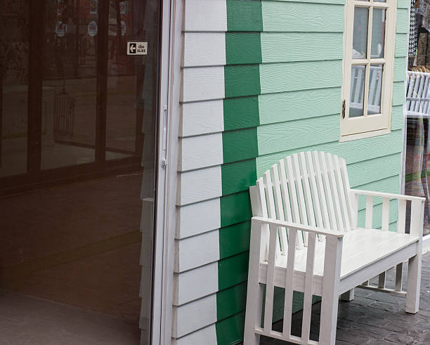 istock green wood wall with white wood desk 527726285