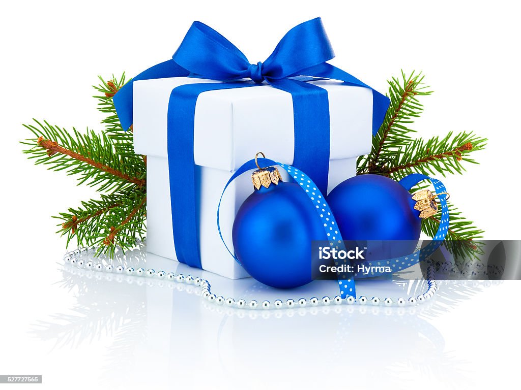 White box tied ribbon bow, pine tree, christmas balls Isolated White box tied blue ribbon bow, pine tree branch and two christmas balls Isolated on white background Blue Stock Photo