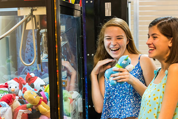 istock Girl at the arcade 527743035