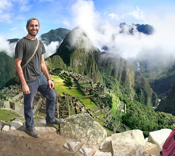 Traveler in Machu Picchu, Peru stock photo