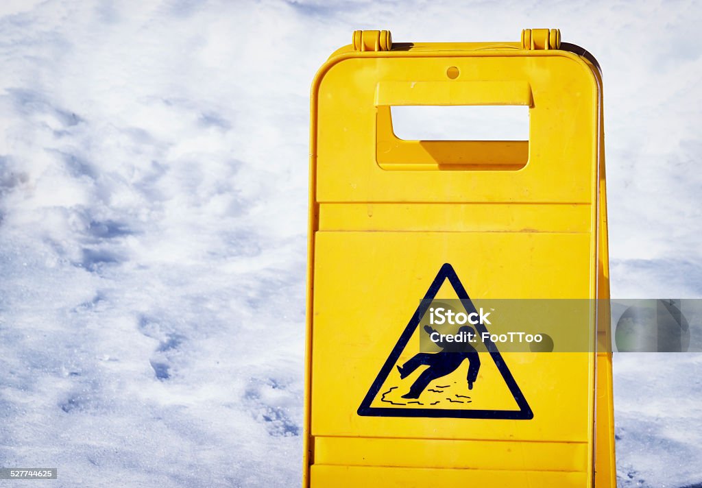 caution slippery surface sign caution wet floor sign at an entrance Falling Stock Photo