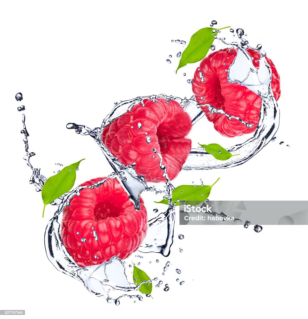 splash Water splash with raspberry and leaf Berry Fruit Stock Photo
