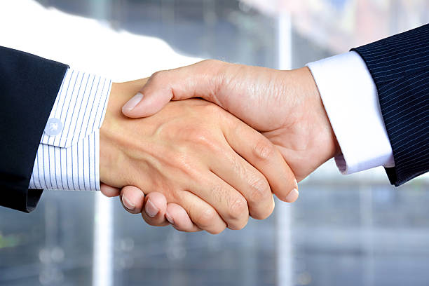 istock Handshake of businessmen 527749135