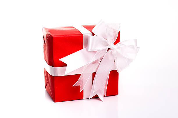 istock Single red gift box with silver ribbon on white background. 527758175
