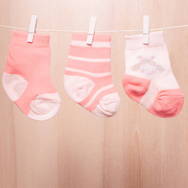 istock Baby girl socks 527758851