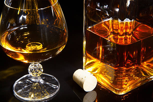 istock glass and a bottle of brandy 527760411