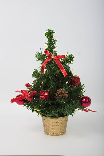 istock Beautiful christmas tree on white with gifts and ornaments 527761891