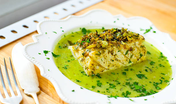 bacalhau no molho verde. - molho verde imagens e fotografias de stock