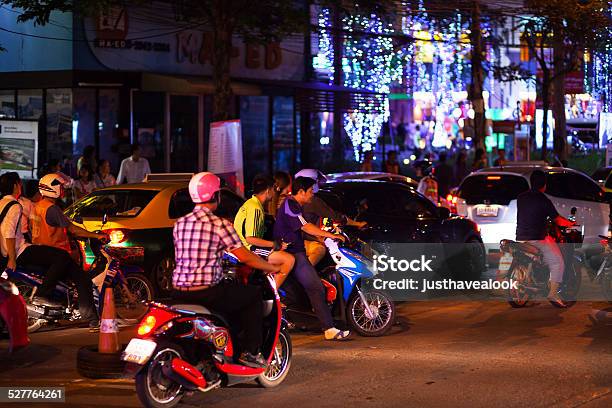 Driving Motorscooter At Night In Bangkok Stock Photo - Download Image Now - Asphalt, Bangkok, Capital Cities