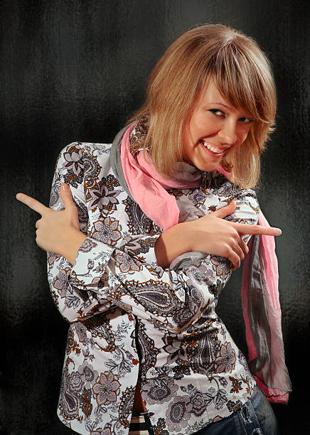 istock Beautiful young happy girl model with smile doing choice 527787067