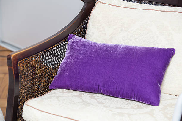 istock Purple pillow on wooden chair 527794967
