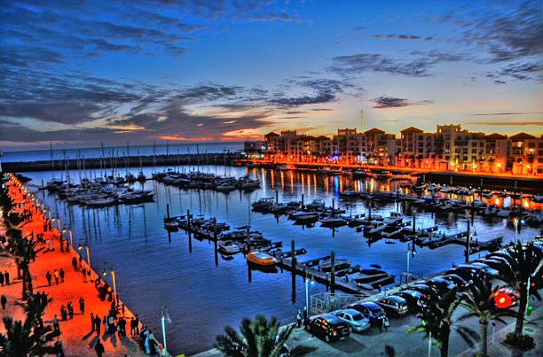 Marina of Agadir Blooming evening in Marina d'Agadir in Agadir, Morocco sunset agadir marocco stock pictures, royalty-free photos & images